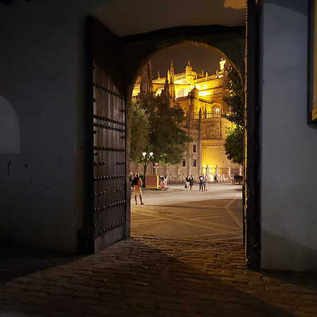 Doorway from the Courtyard of Oranges, view of the Cathedral, Seville