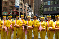 Chinese American women with drums during the Dominican Day Parade