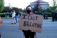 A protester with a sign in Mineola, NY June 1, 202
