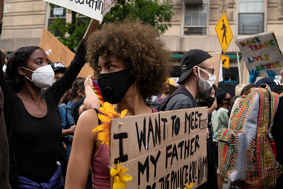 Protesters with signs in Greenwich Village, NY June 2, 2020