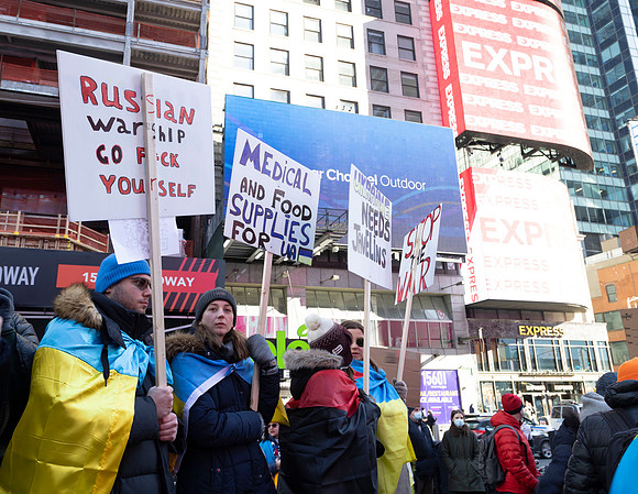 People with signs supporting Ukraine
