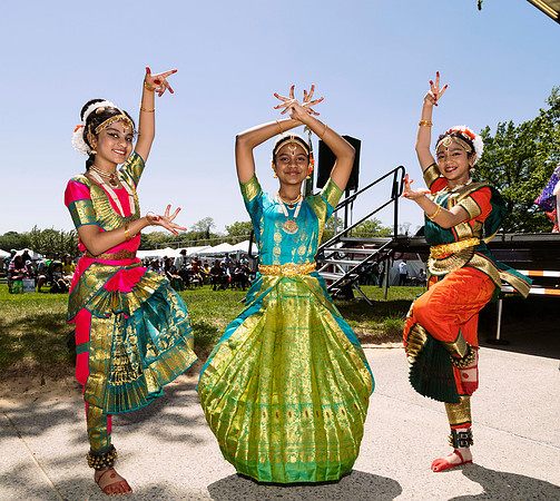 Young dancers pose in. traditional Indian dance costume