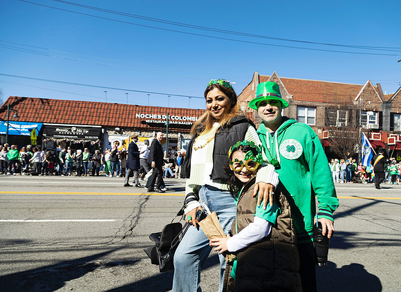 Family at a Saint Patrick's Day Parade, Mineola, New York